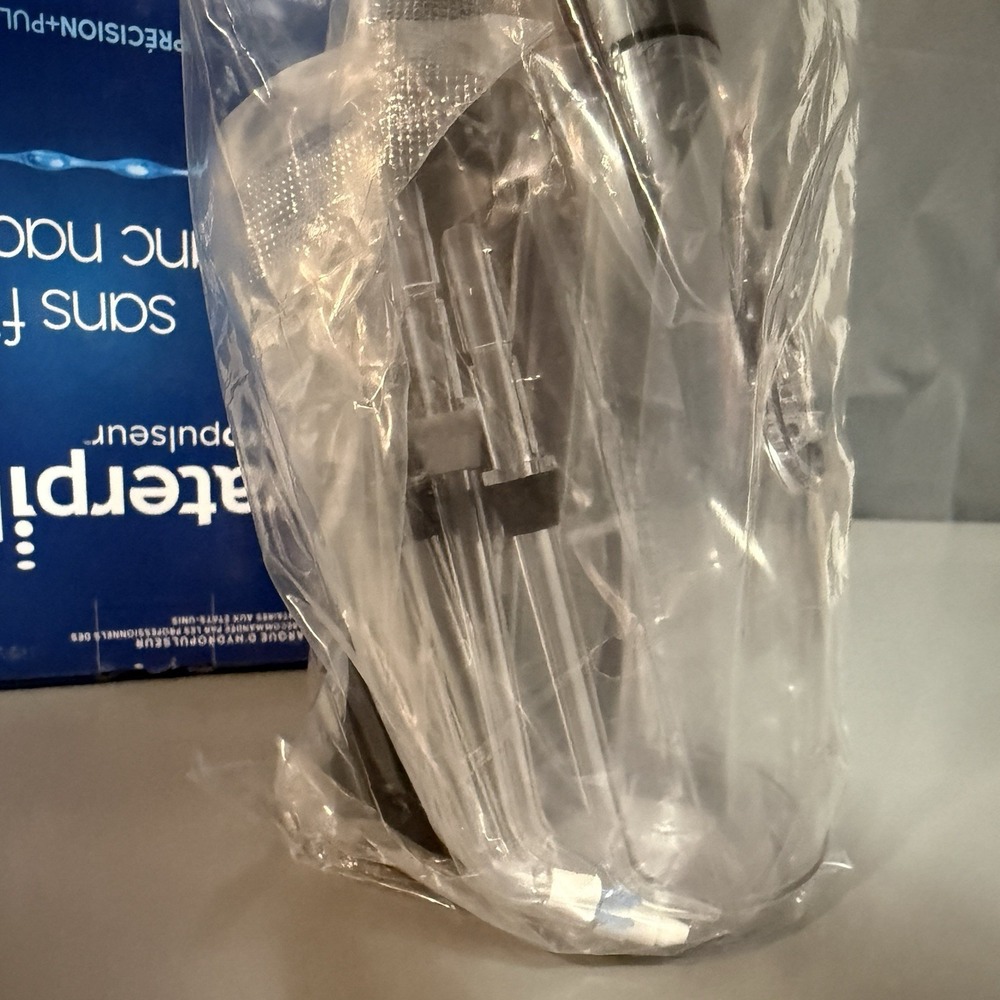 Waterpik Cordless Pearl Black Rechargeable Portable Water Flosser With 4 Tips - Picture 7 of 8